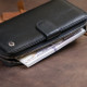 Вертикальный вместительный кошелек из кожи унисекс ST Leather 183540 Черный