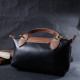 Стильная женская сумка с интересным клапаном из натуральной кожи Vintage 186222 Черная
