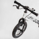 Велобег "Skip Jack" 11057 черно-белый, надувные колеса 12", стальная рама с амортизатором, ручной тормоз, подножка
