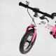 Велобег "Skip Jack" 25025 розово-белый, надувные колеса 12", стальная рама с амортизатором, ручной тормоз, подножка