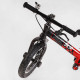 Велобег "Skip Jack" 44538 черно-красный, надувные колеса 12", стальная рама с амортизатором, ручной тормоз, подножка
