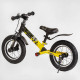 Велобег "Skip Jack" 84115 Черно-желтый, надувные колеса 12", стальная рама с амортизатором, ручной тормоз, подножка